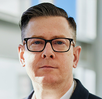 Alexander Hughes als Geschäftsführer eines Kryptowährungshandelsunternehmens im CEO-Porträt
